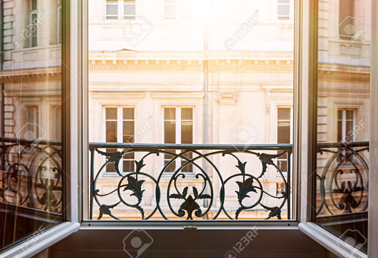 View of european building from an open window in Toulouse, France, with late afternoon sunshine. - 62917032 View of european building from an open window in Toulouse, France, with late afternoon sunshine. - 62917032