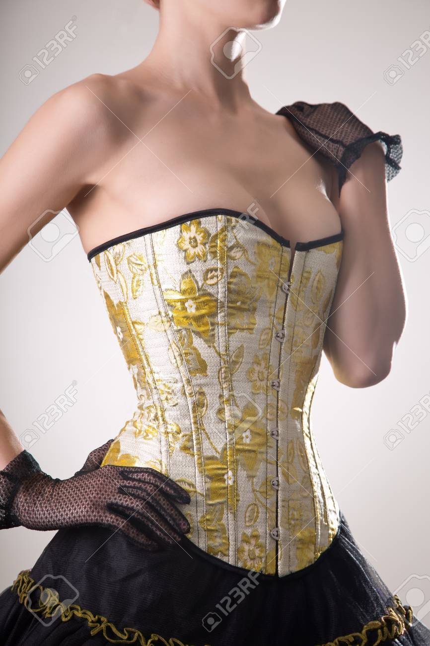 Attractive Young Woman In Burlesque Corset And Skirt, Studio Shot On White  Background Stock Photo, Picture and Royalty Free Image. Image 39267131.