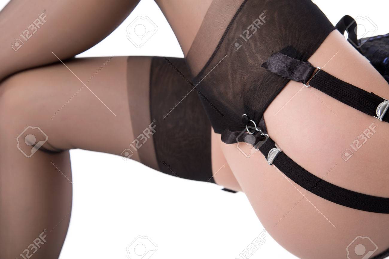 close up pantyhose shot Woman touching black tights on gray background cropped photo ...