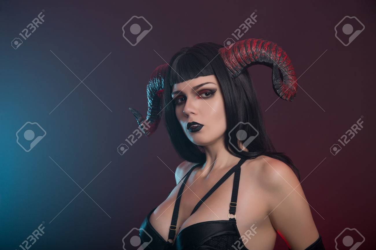 Sexy Demon Girl With Red Horns, Studio Shot For Halloween Stock Photo,  Picture and Royalty Free Image. Image 45931847.