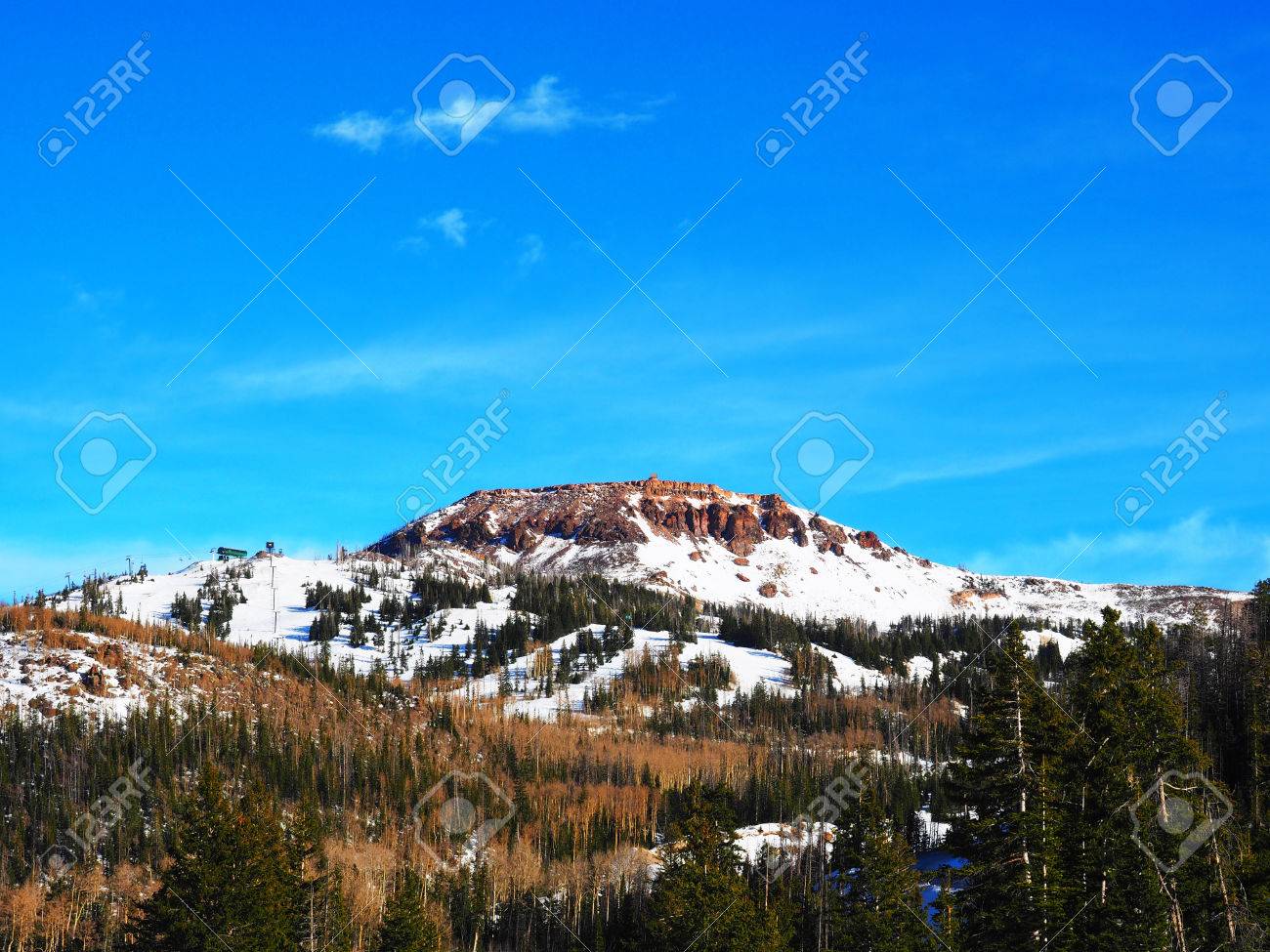 A Small Alpine Ski Hill Below A Flat Topped Mountain Stock P O 50774921 A Small Alpine Ski Hill Below A Flat Topped Mountain Stock P O 50774921
