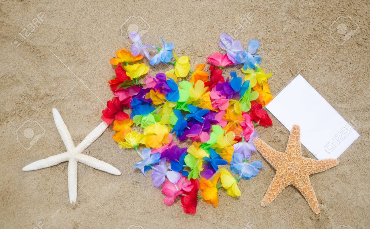 heart shape of the hawaiian flowers two starfishes and piece hawaiian flower paper