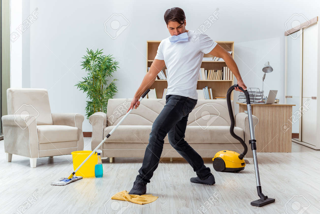 man husband cleaning the house helping wife cleaning a house