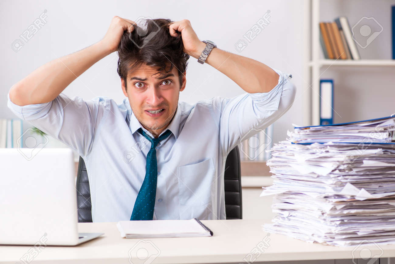 overloaded busy employee with