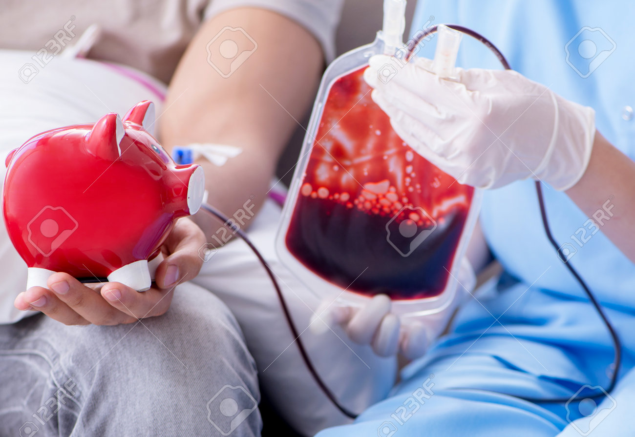 Patient getting blood transfusion in hospital clinic - 125524206 Patient getting blood transfusion in hospital clinic - 125524206