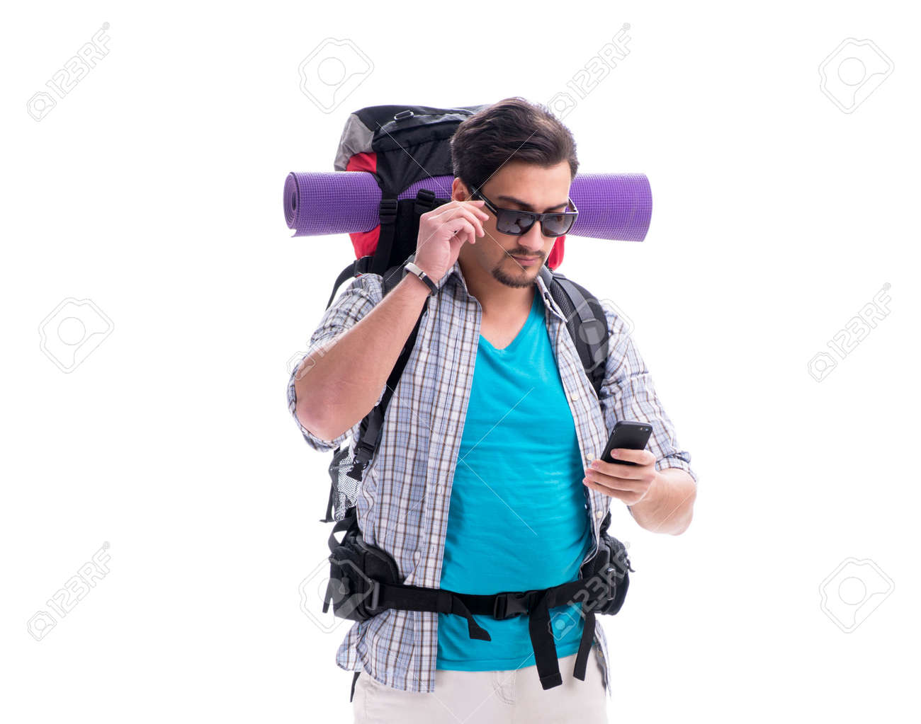Backpacker with large backpack isolated on white - 151497656 Backpacker with large backpack isolated on white - 151497656
