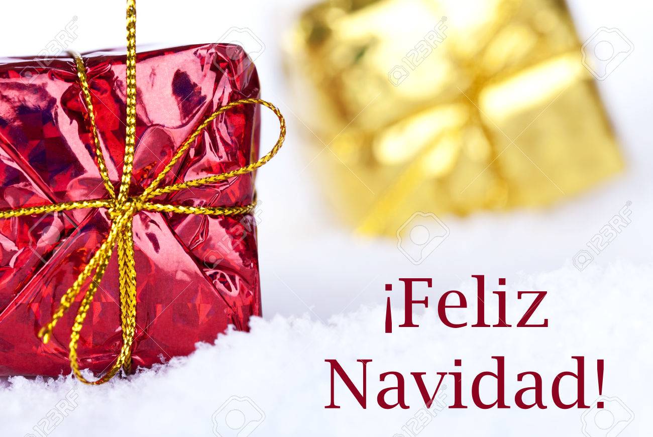 christmas gifts in the snow with the spanish christmas greetings