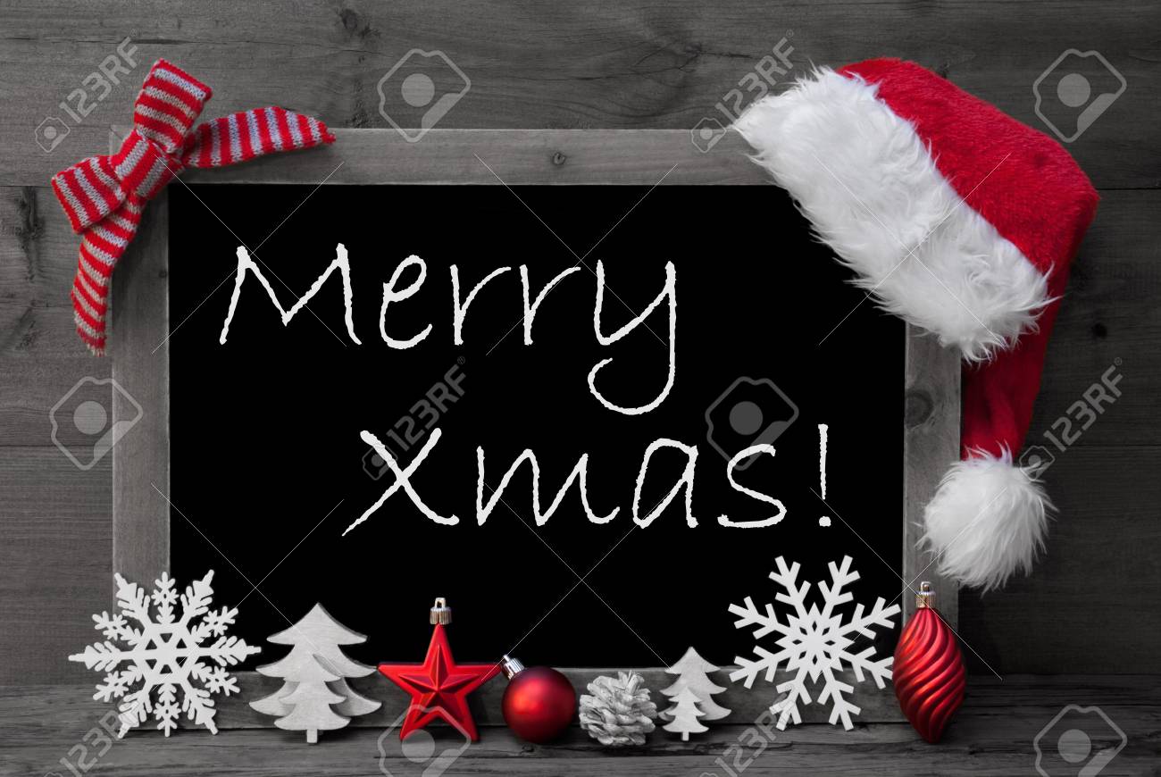 Immagini Stock E Nero Lavagna Bianco Con Il Rosso Cappello Della Santa E Decorazioni Di Natale Come Fiocco Di Neve Albero Palla Di Natale Abete Cono Stella Inglese Testo Merry Xmas