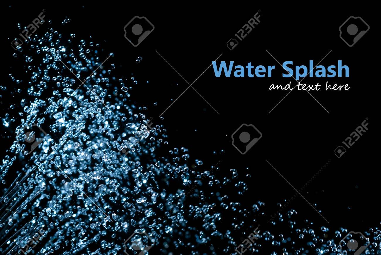 splash of water drops on a black background - 34788094 splash of water drops on a black background - 34788094