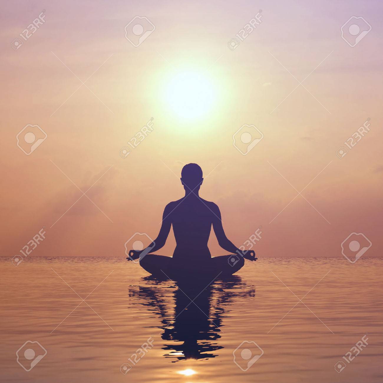 Silhouette young woman practicing yoga on the beach at sunset - 34786930 Silhouette young woman practicing yoga on the beach at sunset - 34786930