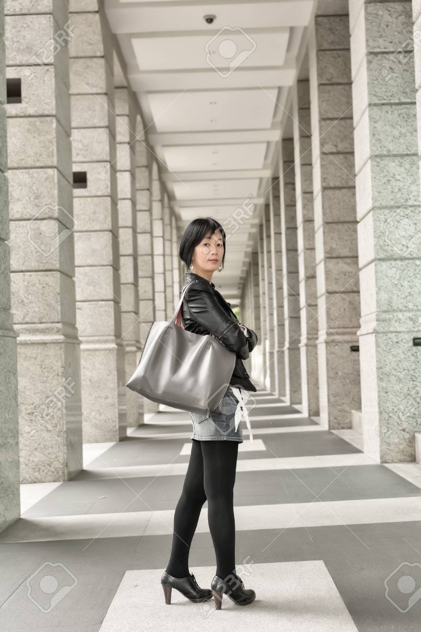 Asian Mature Woman At Street Full Length Portrait Stock Photo Asian Mature Woman At Street Full Length Portrait Stock Photo