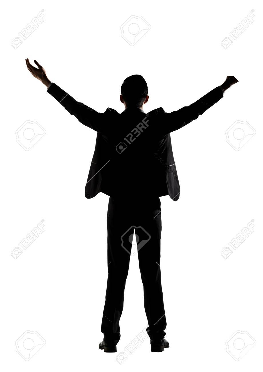 アジア系のビジネスマン気軽に両手を広げて リアビュー 分離された完全な長さの肖像画のシルエット の写真素材 画像素材 Image