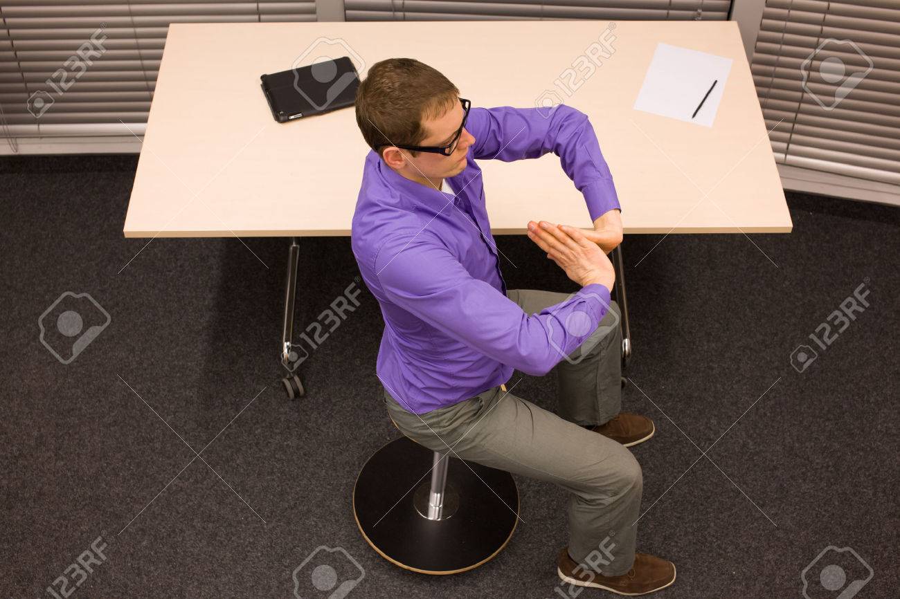 man on pneumatic stool having break for exercise in office work - 37406937 man on pneumatic stool having break for exercise in office work - 37406937