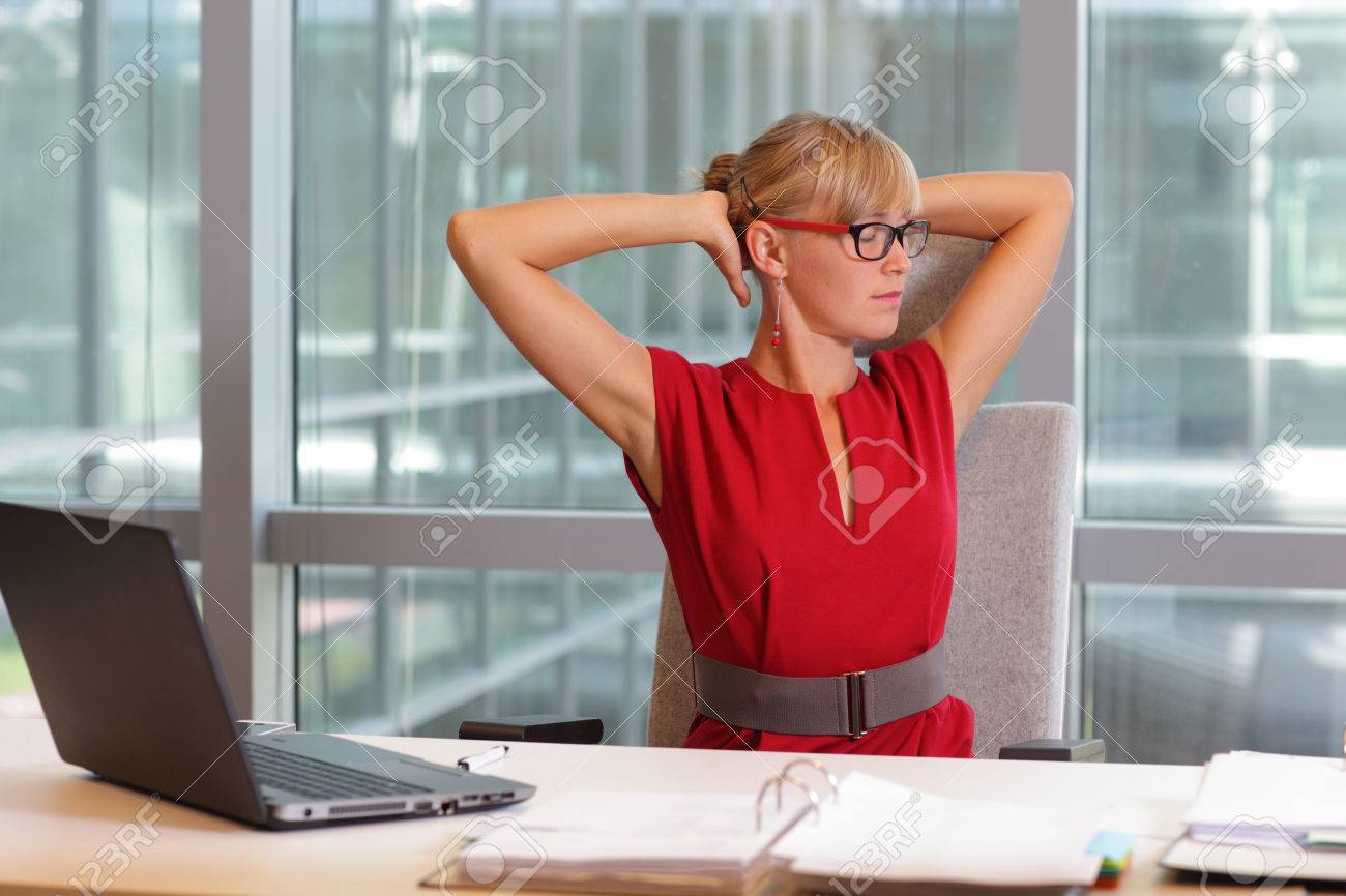 caucasian business woman in eyeglasses relaxing neck,stretching arms - short break for exercise on chair in officecaucasian business woman in eyeglasses relaxing neck,stretching arms - short break for exercise on chair in office - 44958173 caucasian business woman in eyeglasses relaxing neck,stretching arms - short break for exercise on chair in officecaucasian business woman in eyeglasses relaxing neck,stretching arms - short break for exercise on chair in office - 44958173