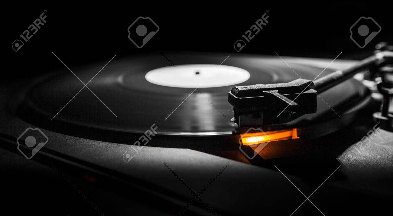 old style turntable with needle - b w and orange light - 27415554 old style turntable with needle - b w and orange light - 27415554
