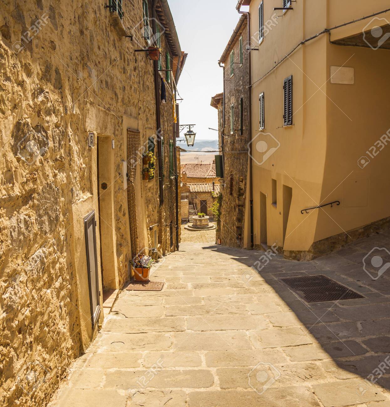 A typical small street of Castiglione d'Orcia, an ancient village in Tuscany, Italy - 136078628 A typical small street of Castiglione d'Orcia, an ancient village in Tuscany, Italy - 136078628