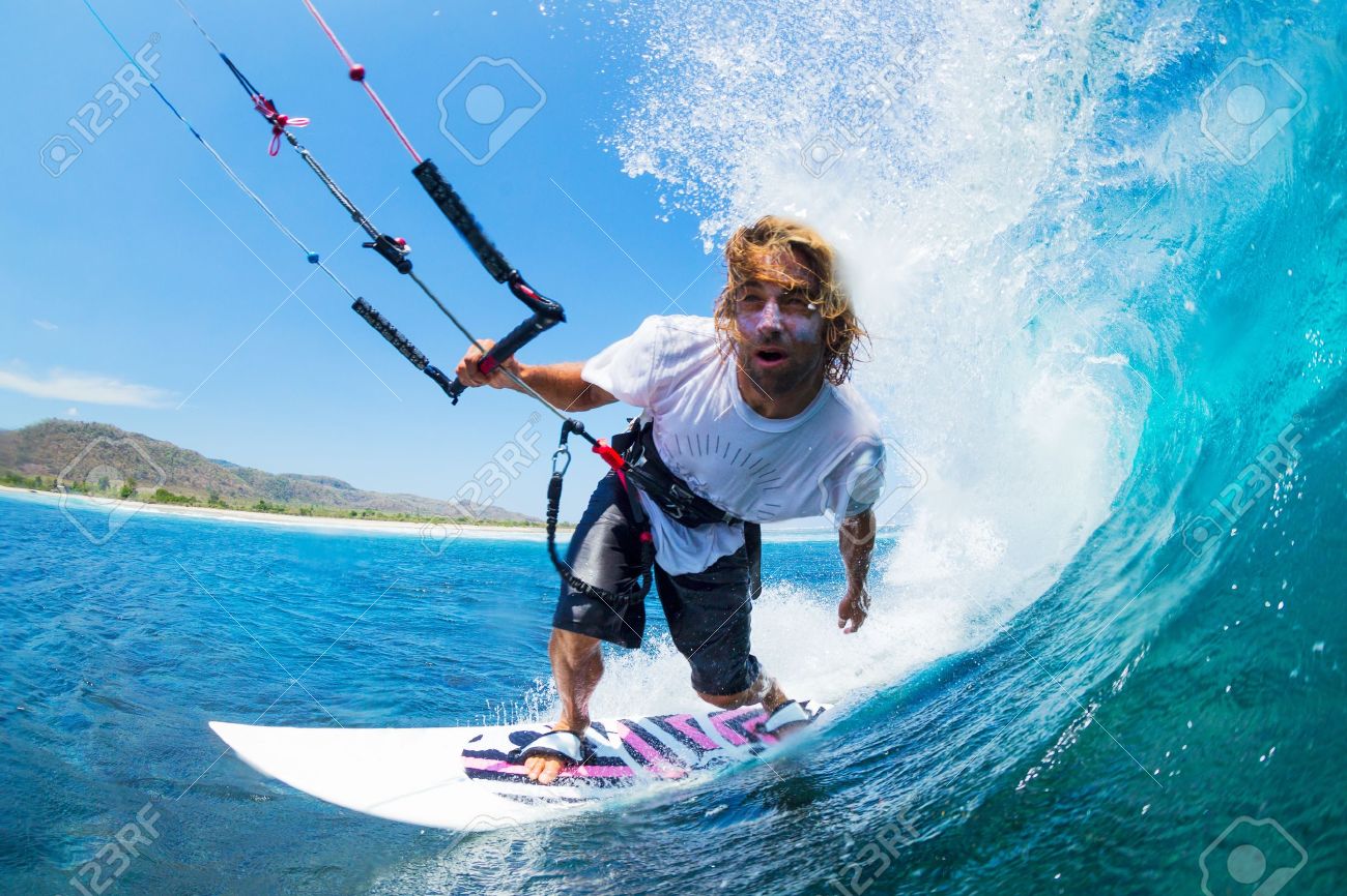 Extreme Sport, Kite Surfer Riding Wave getting Barreled - 19249301 Extreme Sport, Kite Surfer Riding Wave getting Barreled - 19249301