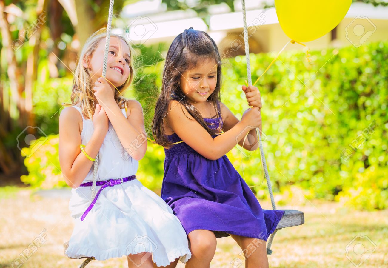 little girls playing two little happy little girls playing on swing stock photo 22168262 little on photo picture and royalty little girls playing two little happy little girls playing on swing stock photo 22168262 little on photo picture and royalty