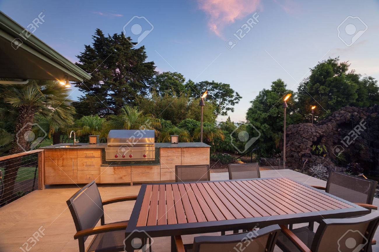 Backyard Patio With BBQ Grill And Dining Table On Deck Stock Photo, Picture And Royalty Free Image. Image 30426225.