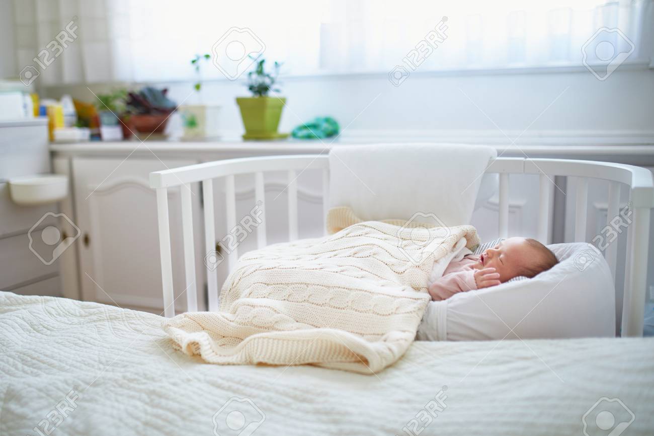 baby bed attached to parents