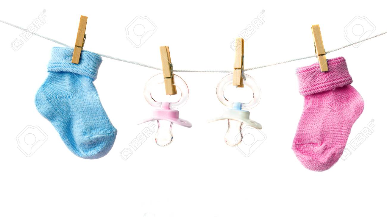 Pink And Blue Baby Socks And Pacifiers On The Clothesline Stock Photo Picture And Royalty Free Image Image 114435637