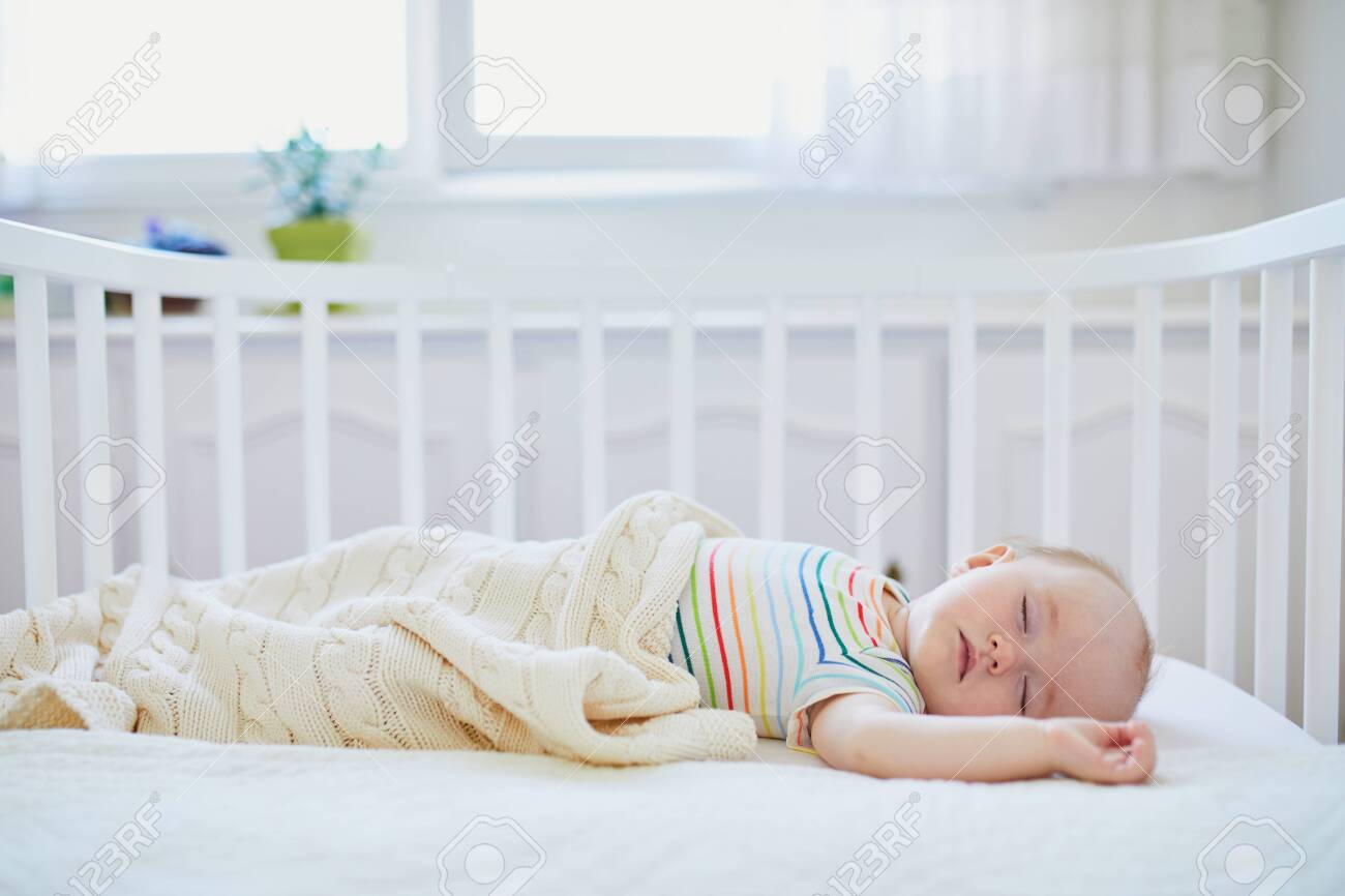 baby bed attached to parents bed