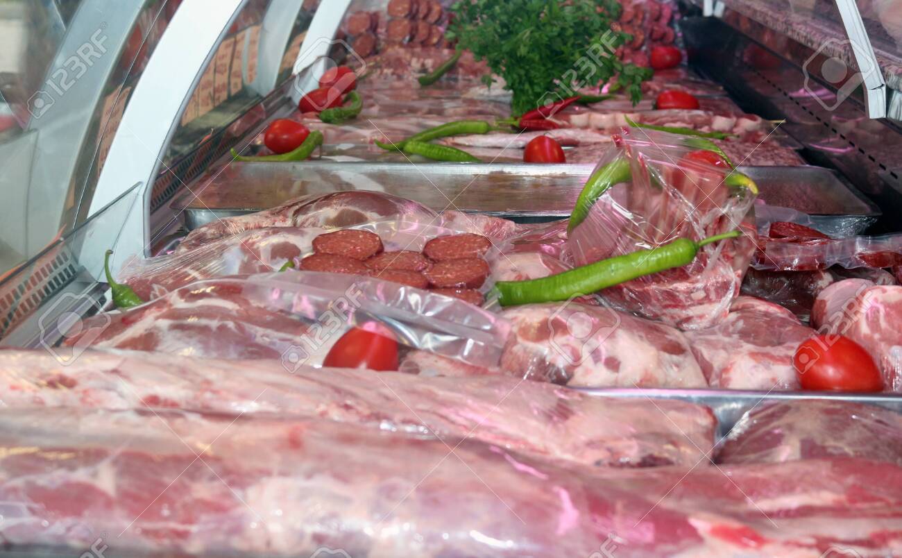 Variety of Raw Meat and Sausages in Butcher Shop - 146048204 Variety of Raw Meat and Sausages in Butcher Shop - 146048204