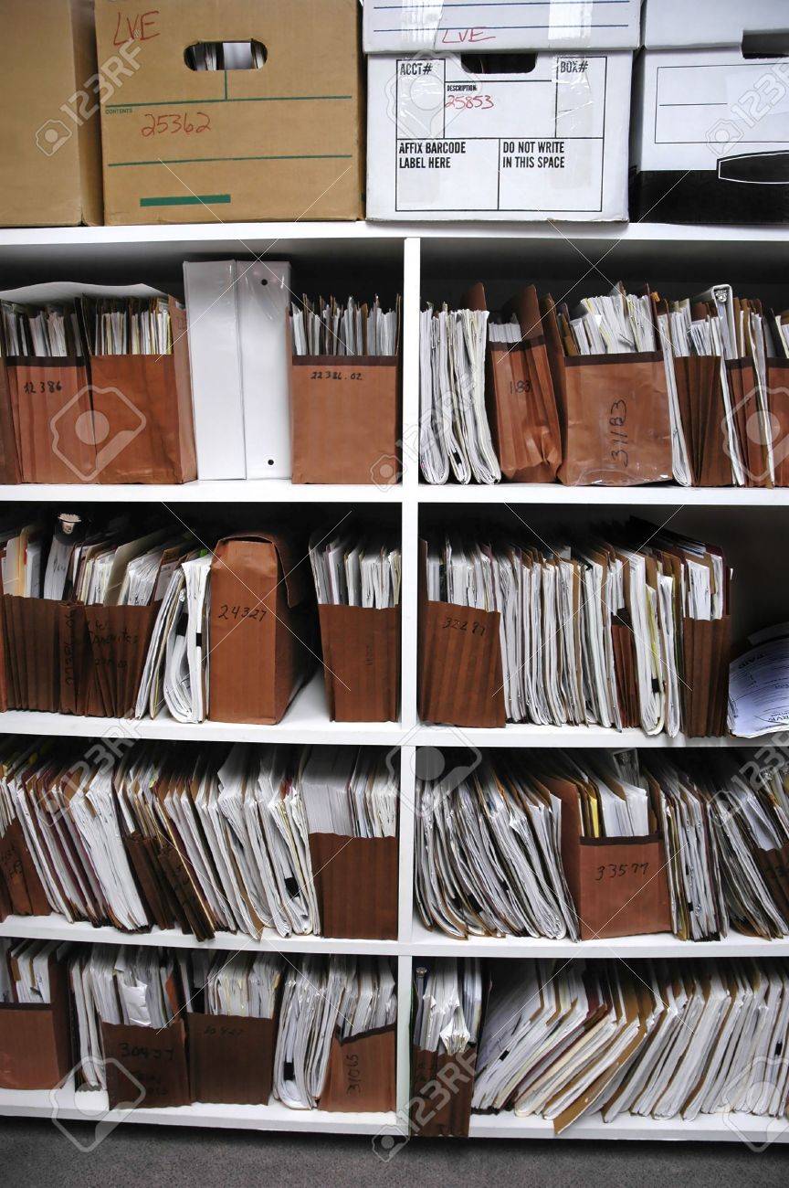 Office Shelves Full Of Files And Boxes Stock Photo, Picture and Royalty  Free Image. Image 736836., image size:864x1300