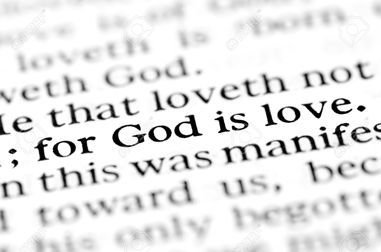 Detail closeup God is love scripture in bible verse Stock