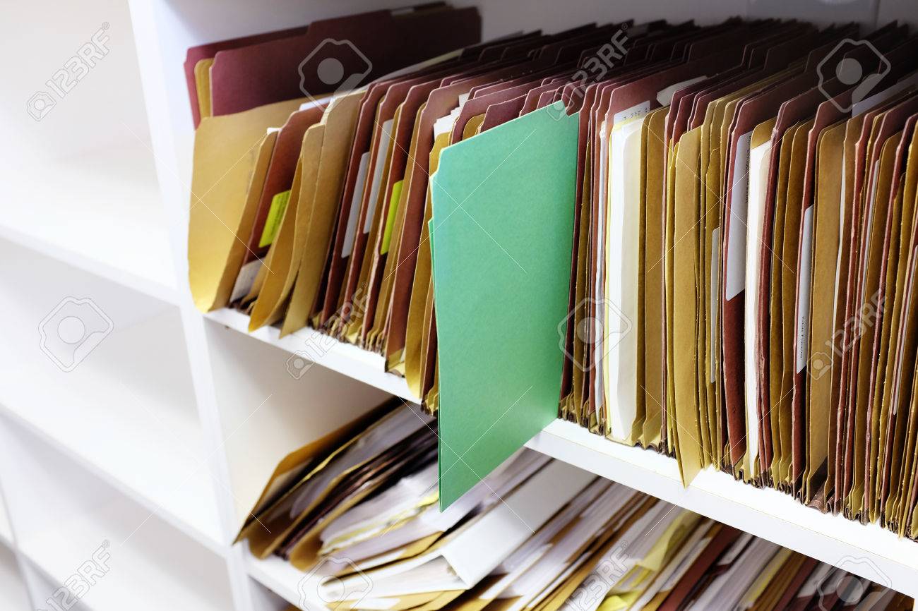Green Folder Files In Office For Organization Stock Photo, Picture and  Royalty Free Image. Image 71936016., image size:1300x866