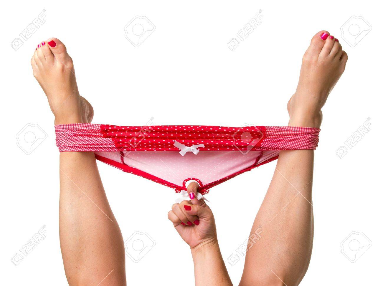 Woman Holding Legs Up With Hand In Panties Isolated On White Background  Banco de Imagens Royalty Free, Ilustrações, Imagens e Banco de Imagens.  Image 15608201.