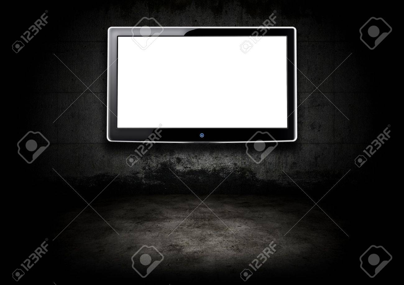 暗い部屋のフラット スクリーン テレビ の写真素材 画像素材 Image