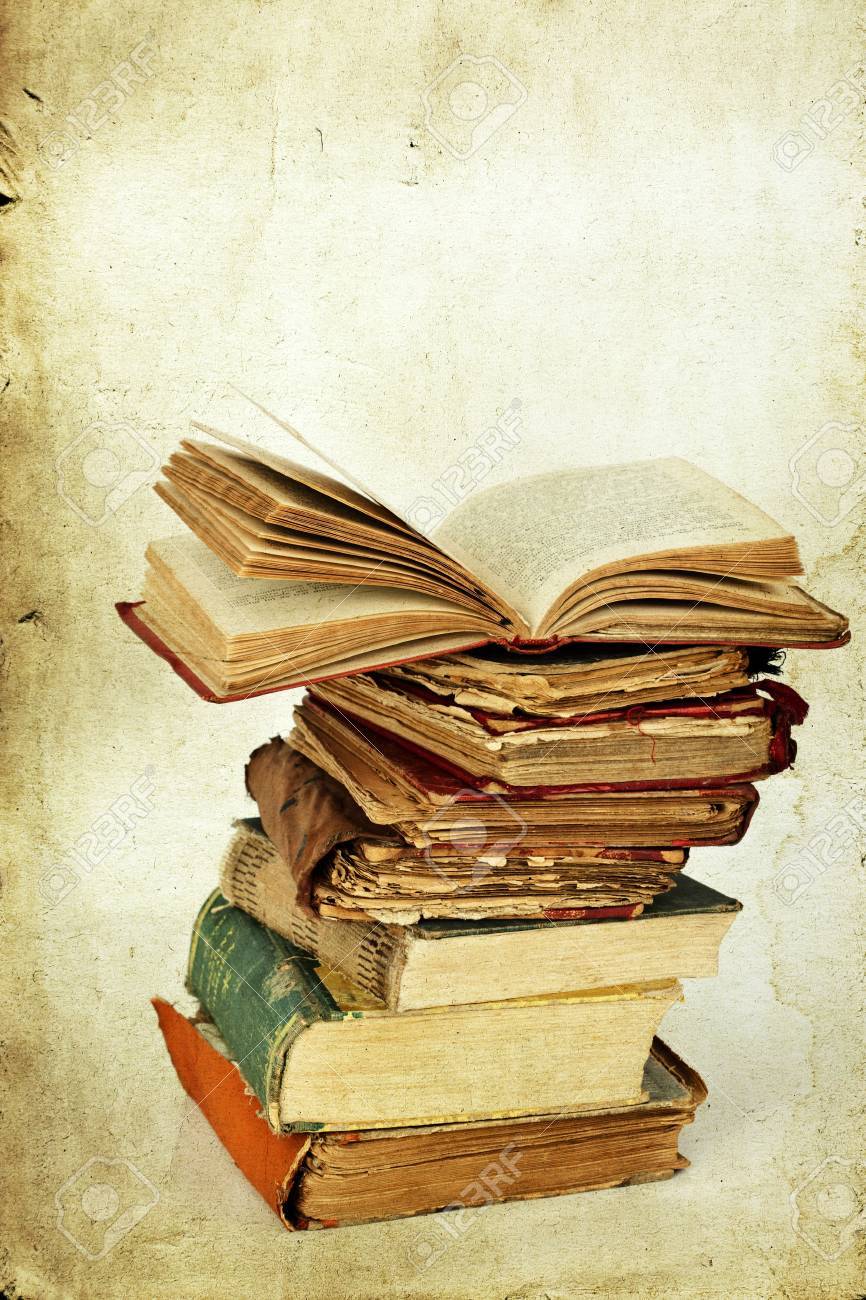 pile of old books on vintage background stock photo picture and