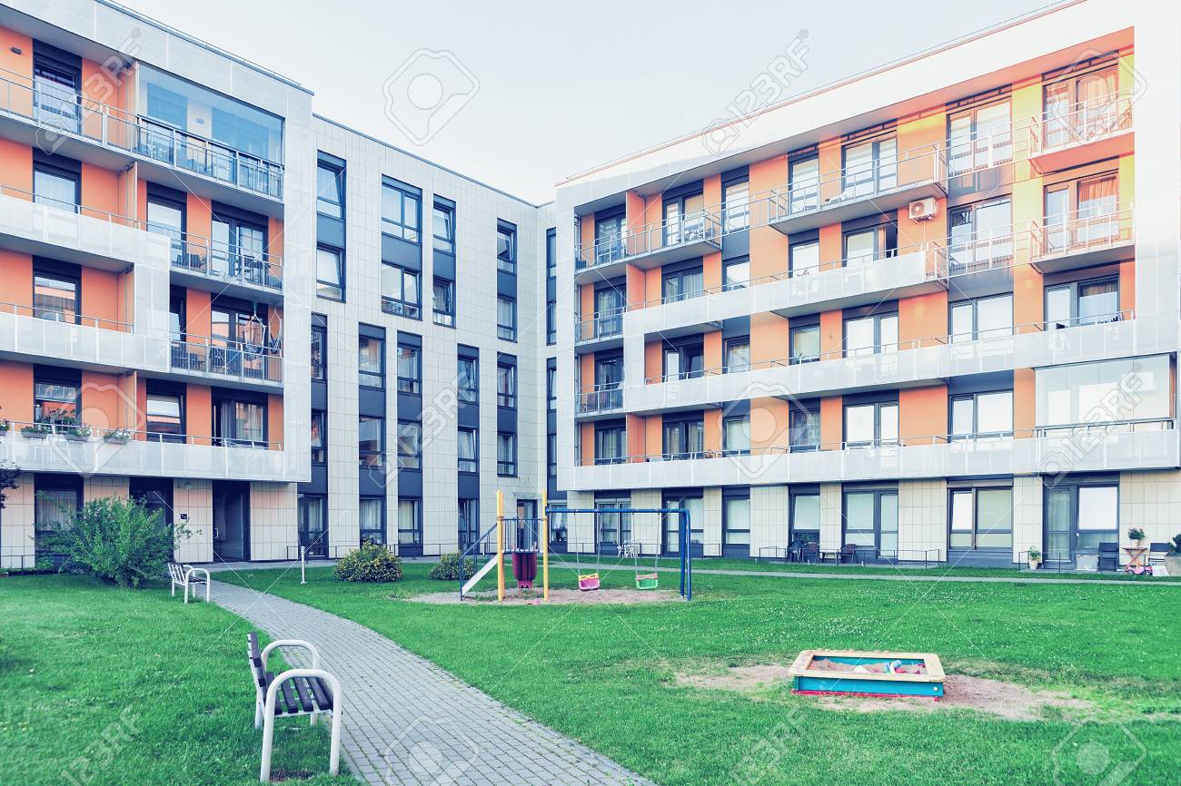 Vilnius, Lithuania - July 30, 2017: Complex of new apartment residential building with children playground as outdoor facilities. - 90728985 Vilnius, Lithuania - July 30, 2017: Complex of new apartment residential building with children playground as outdoor facilities. - 90728985