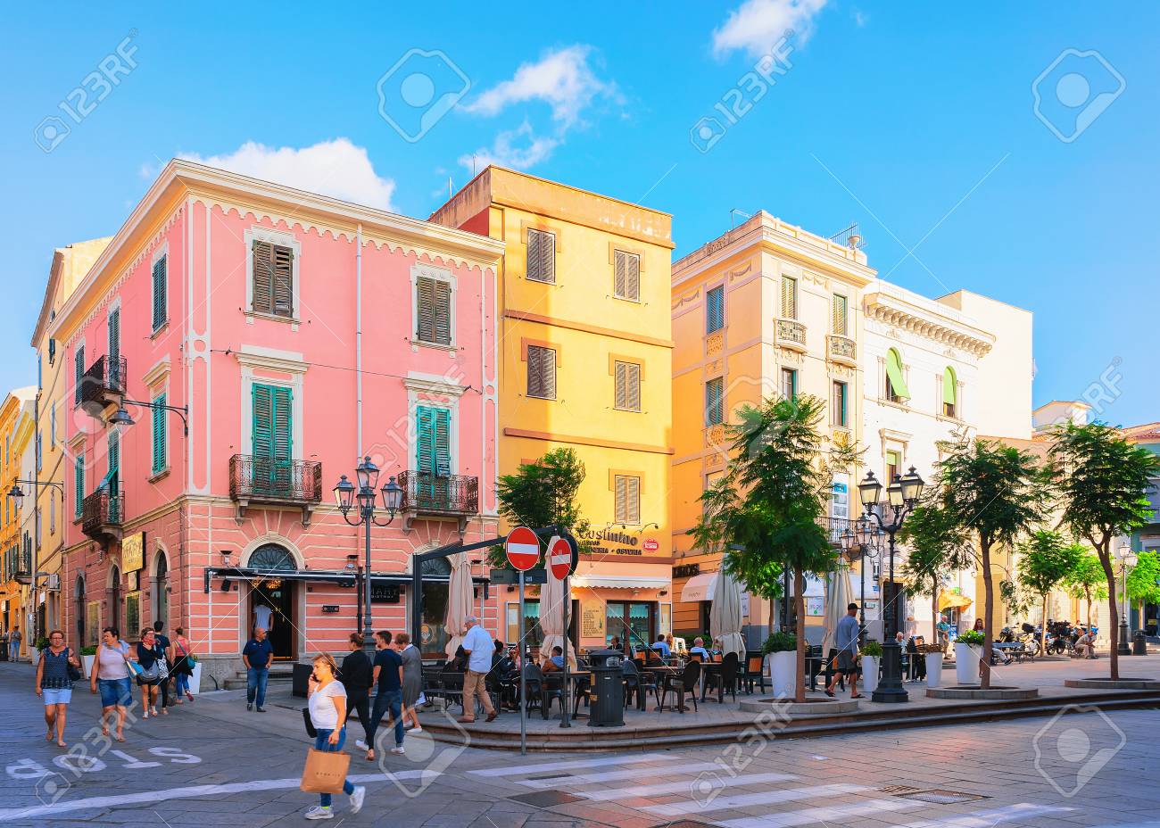 Olbia, Italy - September 11, 2017: People in street cafe at Corso Umberto Street in Olbia, Sardinia, Italy - 97535398 Olbia, Italy - September 11, 2017: People in street cafe at Corso Umberto Street in Olbia, Sardinia, Italy - 97535398