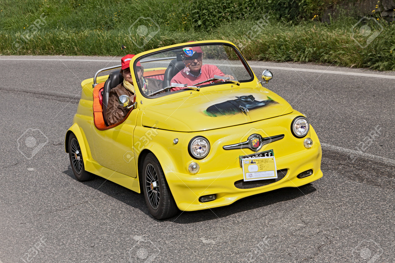 A Yellow Vintage Tuned Car Fiat 500 Abarth Roadster Running In Stock Photo Picture And Royalty Free Image Image 20390360