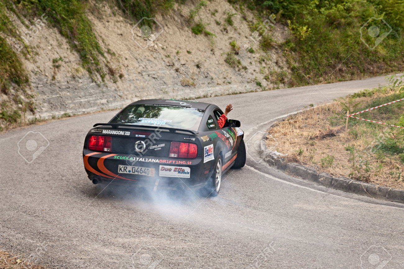 A Drift Racing Car Ford Mustang In Action With Smoking Tires In Hairpin Bend At Rally Della Romagna 13 On July 28 13 In Dovadola Fc Italy Stock Photo Picture And Royalty