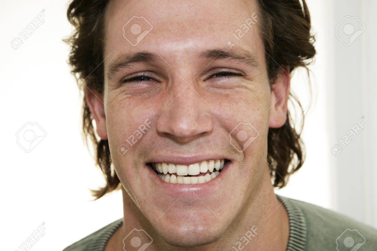 Portrait of male laughing at camera - 7597278 Portrait of male laughing at camera - 7597278