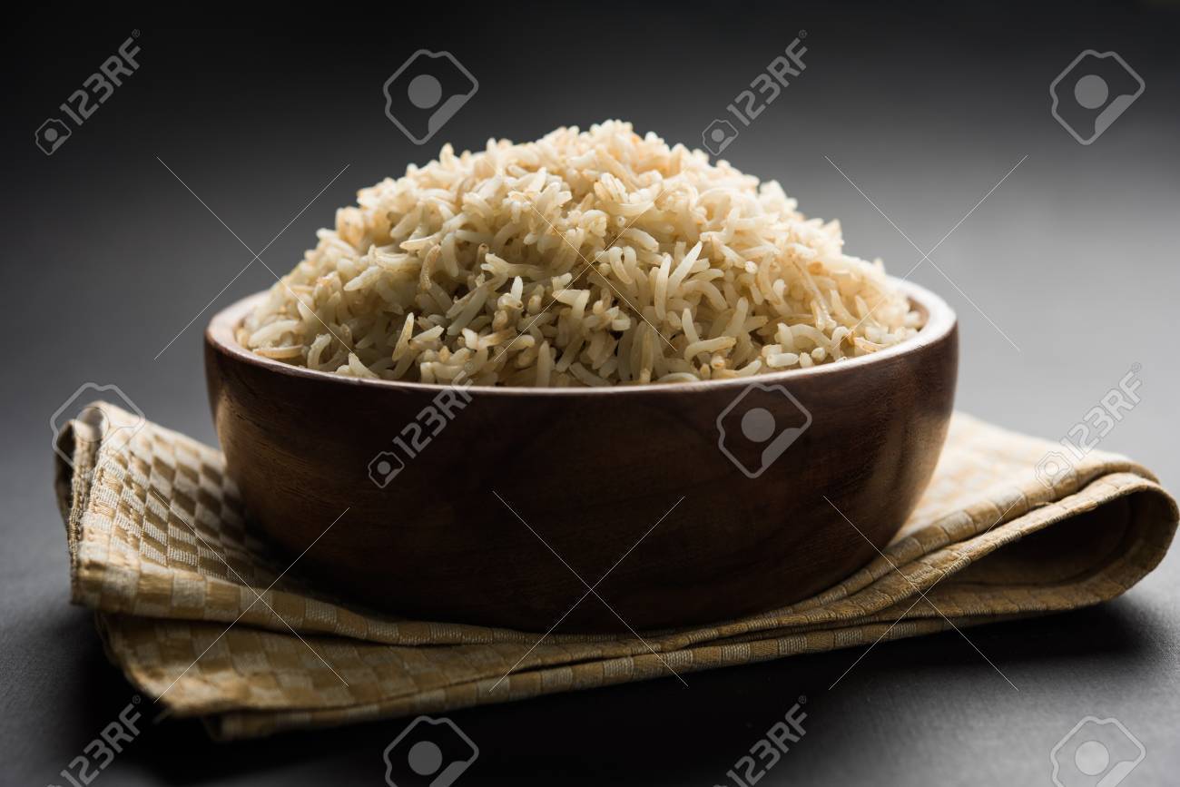 Stock Photo of cooked Brown Basmati rice served in a bowl, selective focus - 87446975 Stock Photo of cooked Brown Basmati rice served in a bowl, selective focus - 87446975