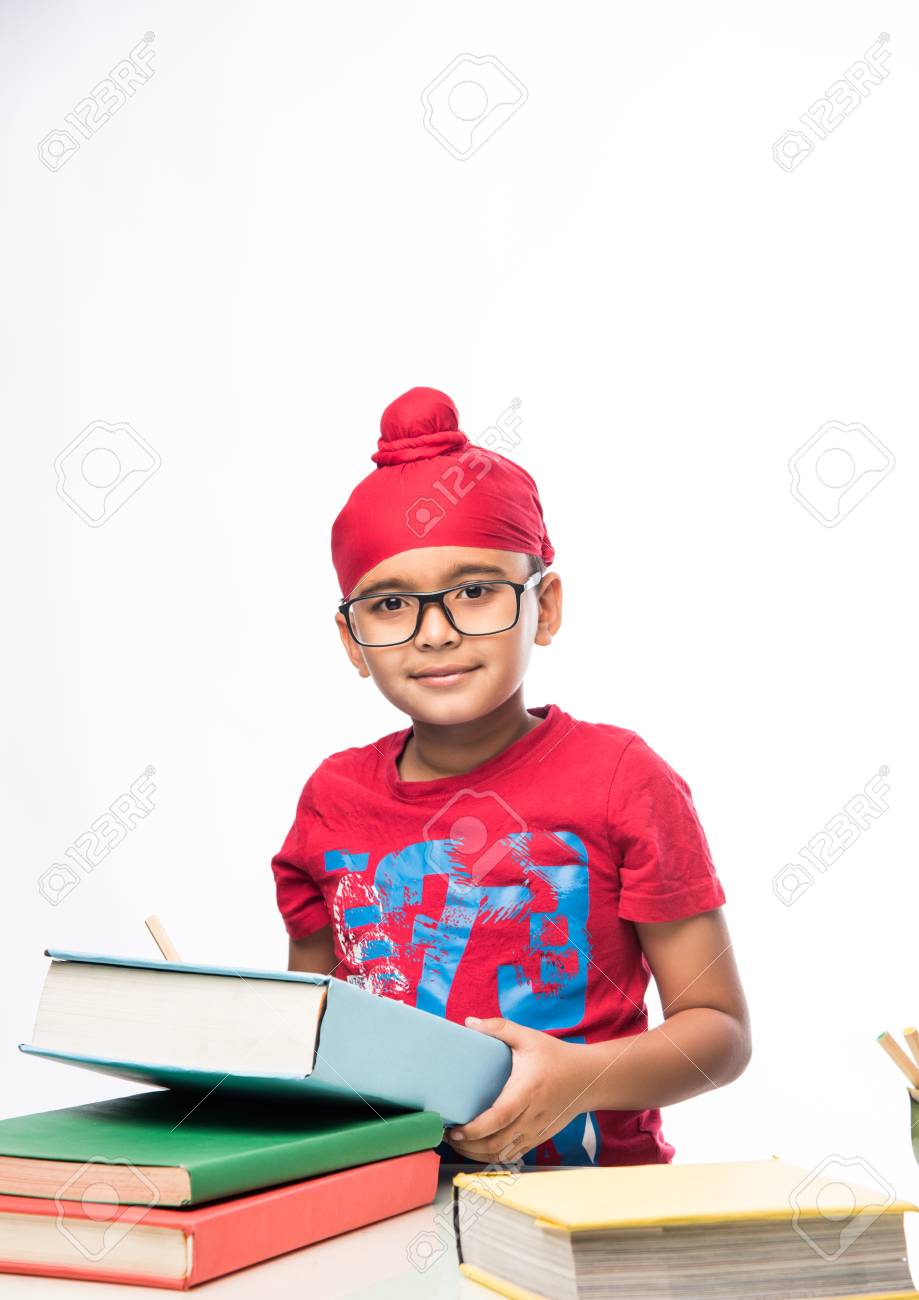 Small Indian/sikh Boy Studying At Study Table With Books Stock Photo,  Picture and Royalty Free Image. Image 119303590., image size:919x1300