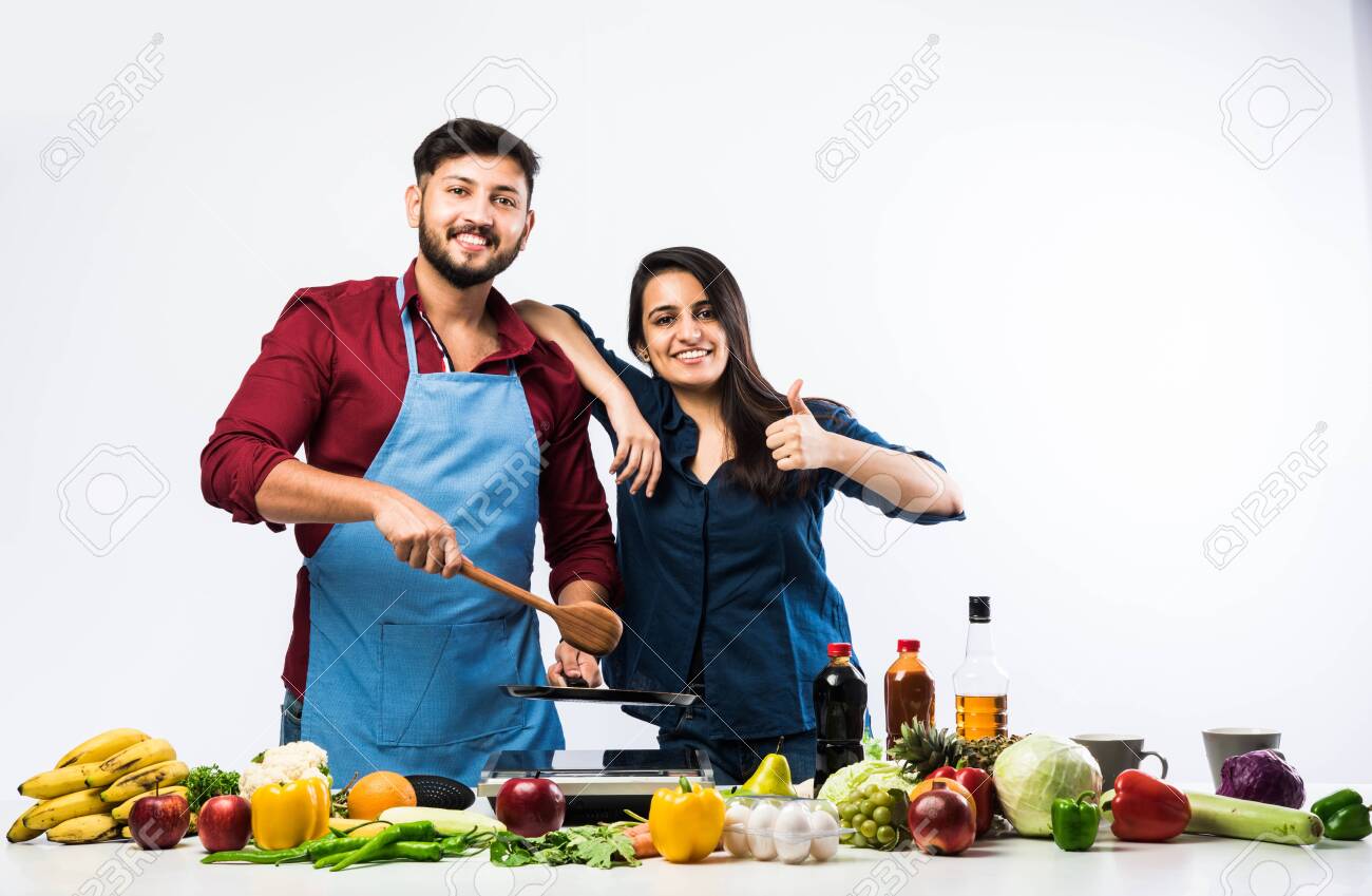 subodh sathe / stockimagefactoryIndian Couple In Kitchen