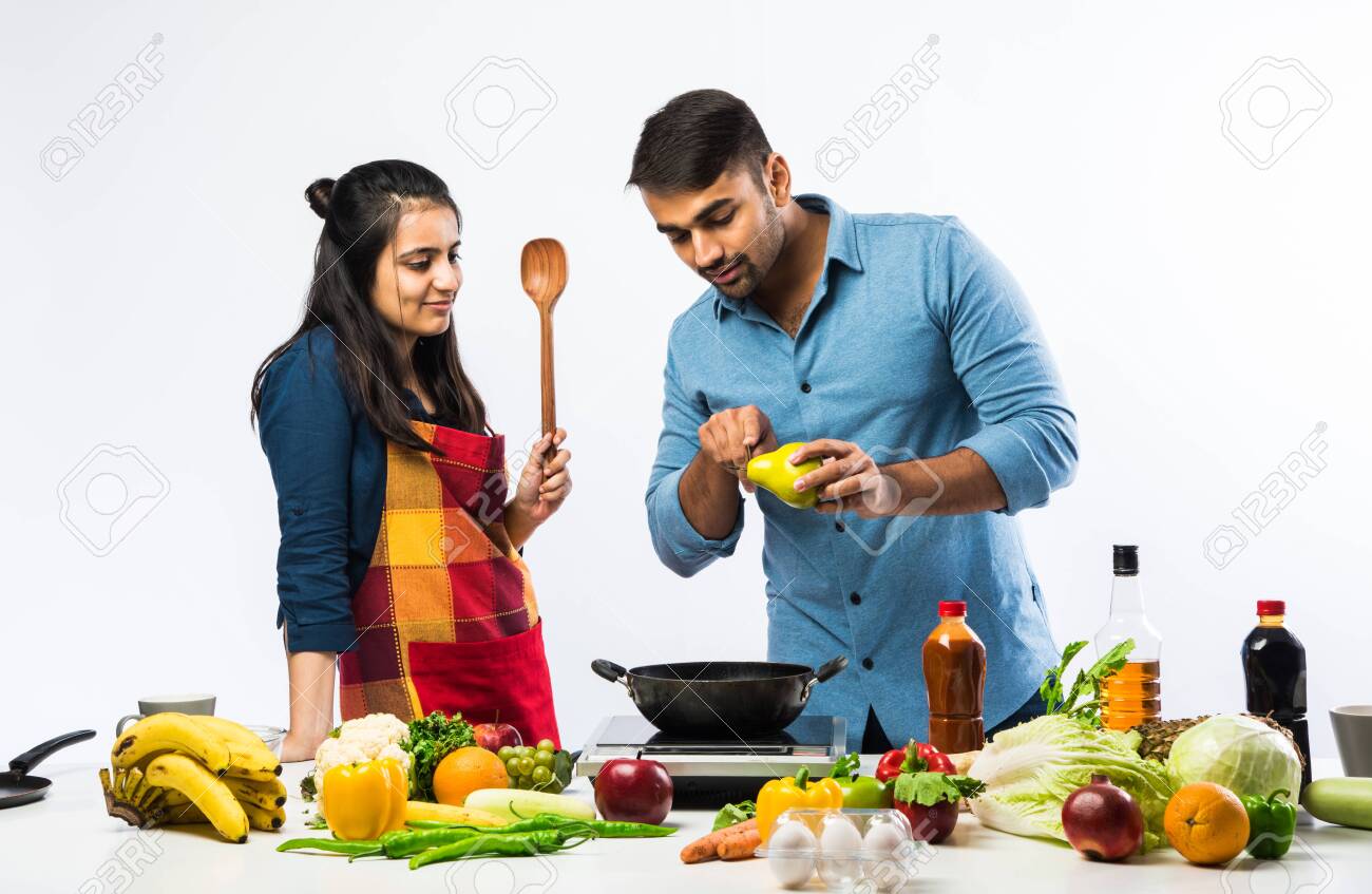 subodh sathe / stockimagefactoryIndian Couple In Kitchen