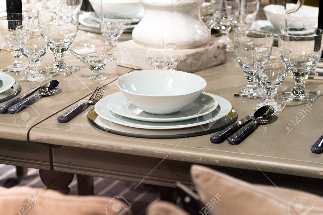 High-End Table Setting With Fine Cutlery, Glassware And Crockery ... High-End Table Setting With Fine Cutlery, Glassware And Crockery ...