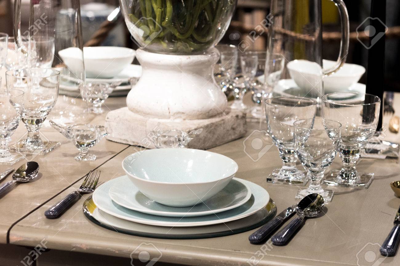 High-End Table Setting With Fine Cutlery, Glassware And Crockery ... High-End Table Setting With Fine Cutlery, Glassware And Crockery ...