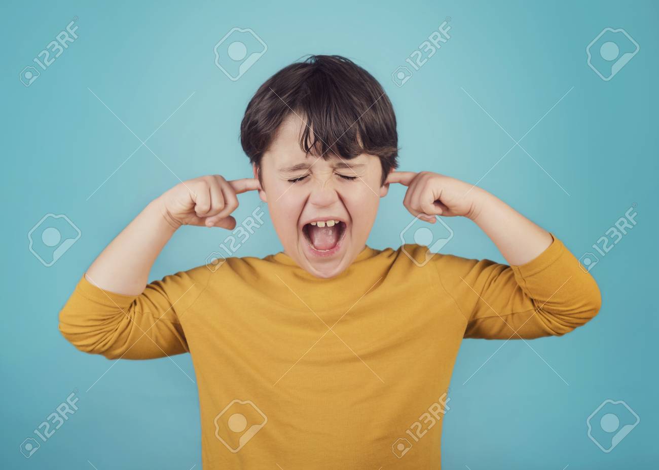 97578436-portrait-of-a-screaming-little-boy-child-covering-ears-with-hands.jpg
