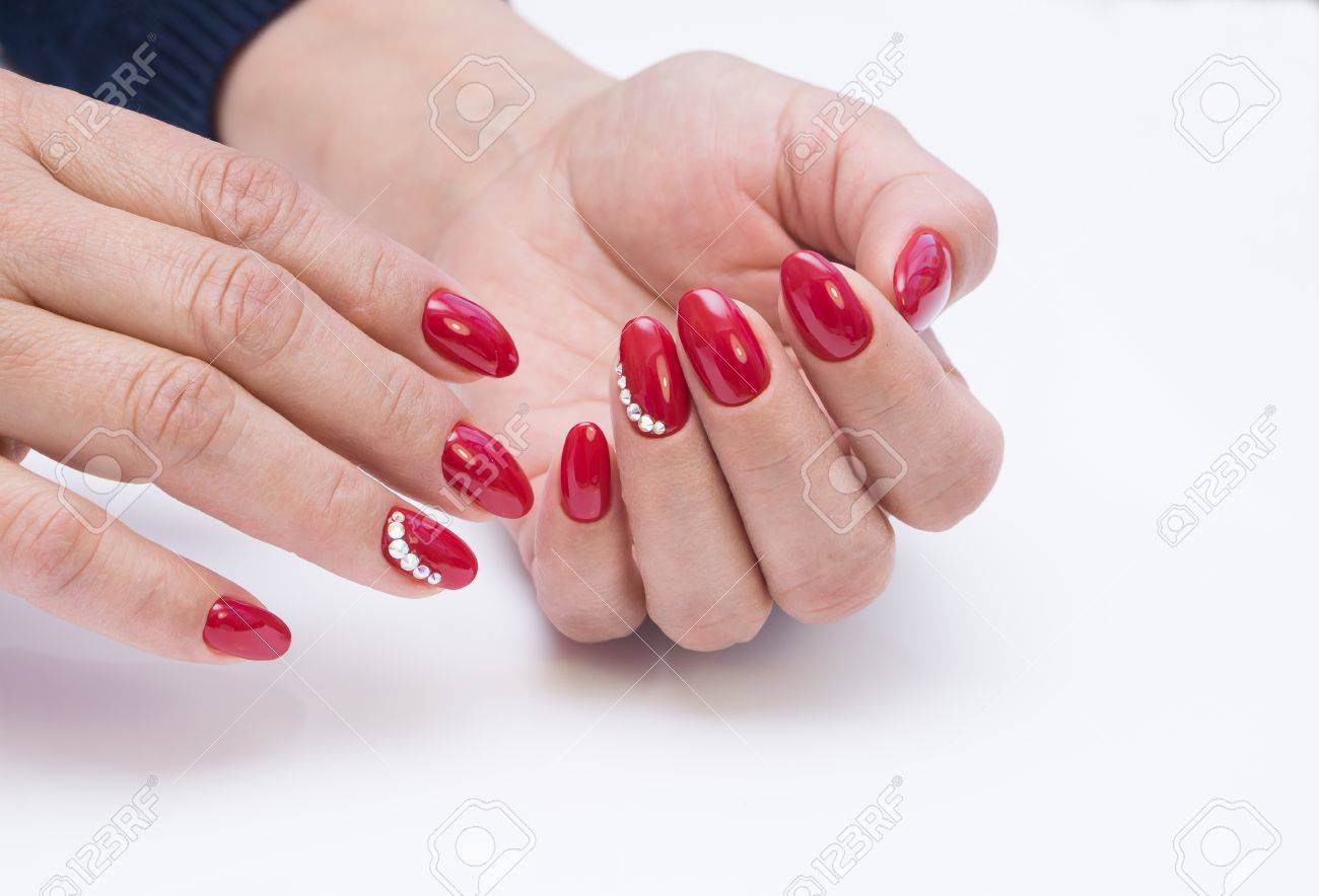 Hands with beautiful manicure. Natural nails with gel polish - 79825134 Hands with beautiful manicure. Natural nails with gel polish - 79825134