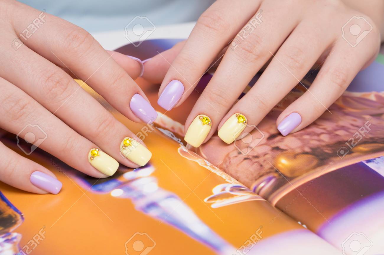 Natural nails with gel polish applied. Ideal manicure and women's hands. - 92334625 Natural nails with gel polish applied. Ideal manicure and women's hands. - 92334625