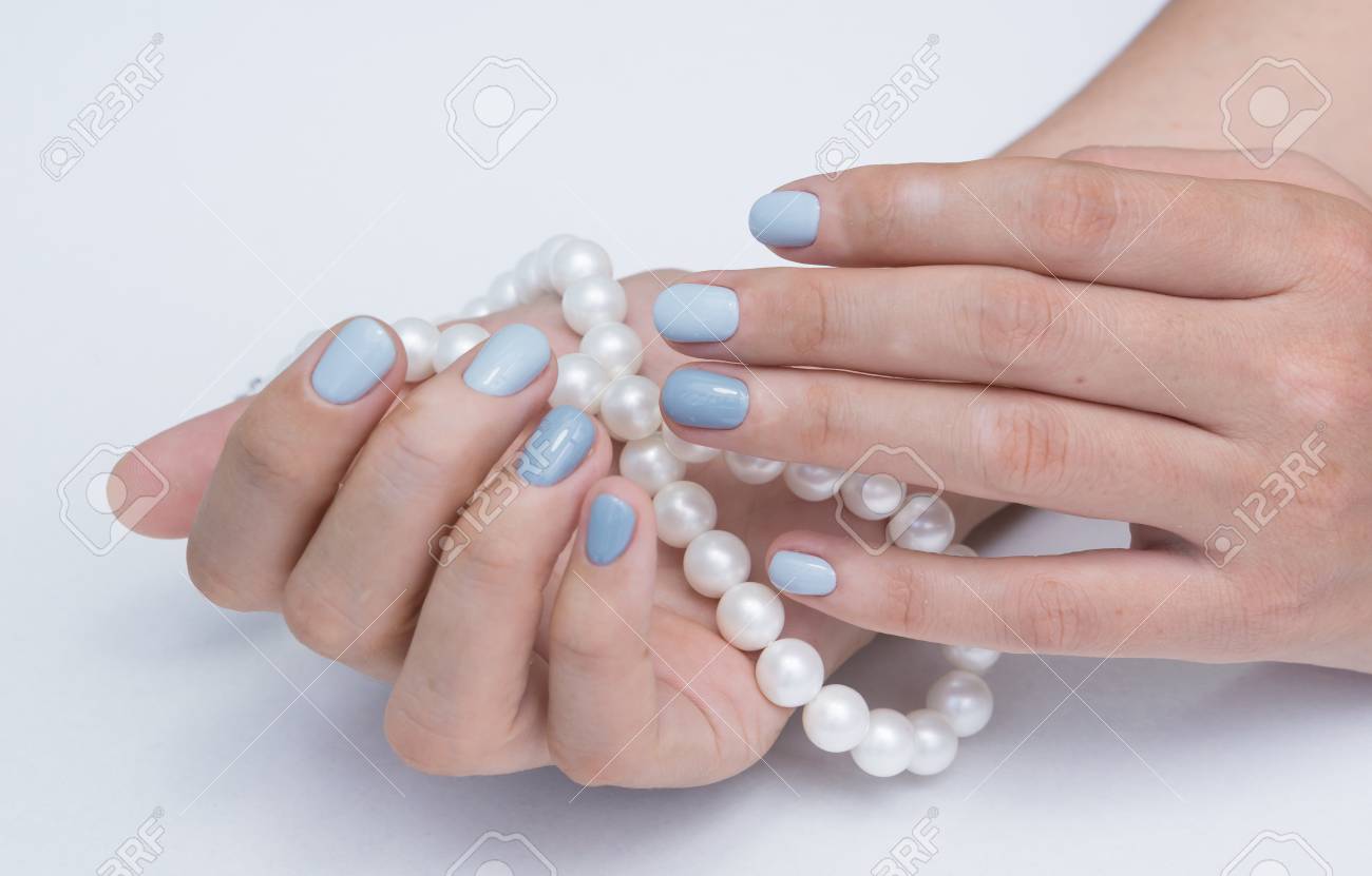 Natural nails with gel polish applied. Ideal manicure and women's hands. - 92401824 Natural nails with gel polish applied. Ideal manicure and women's hands. - 92401824