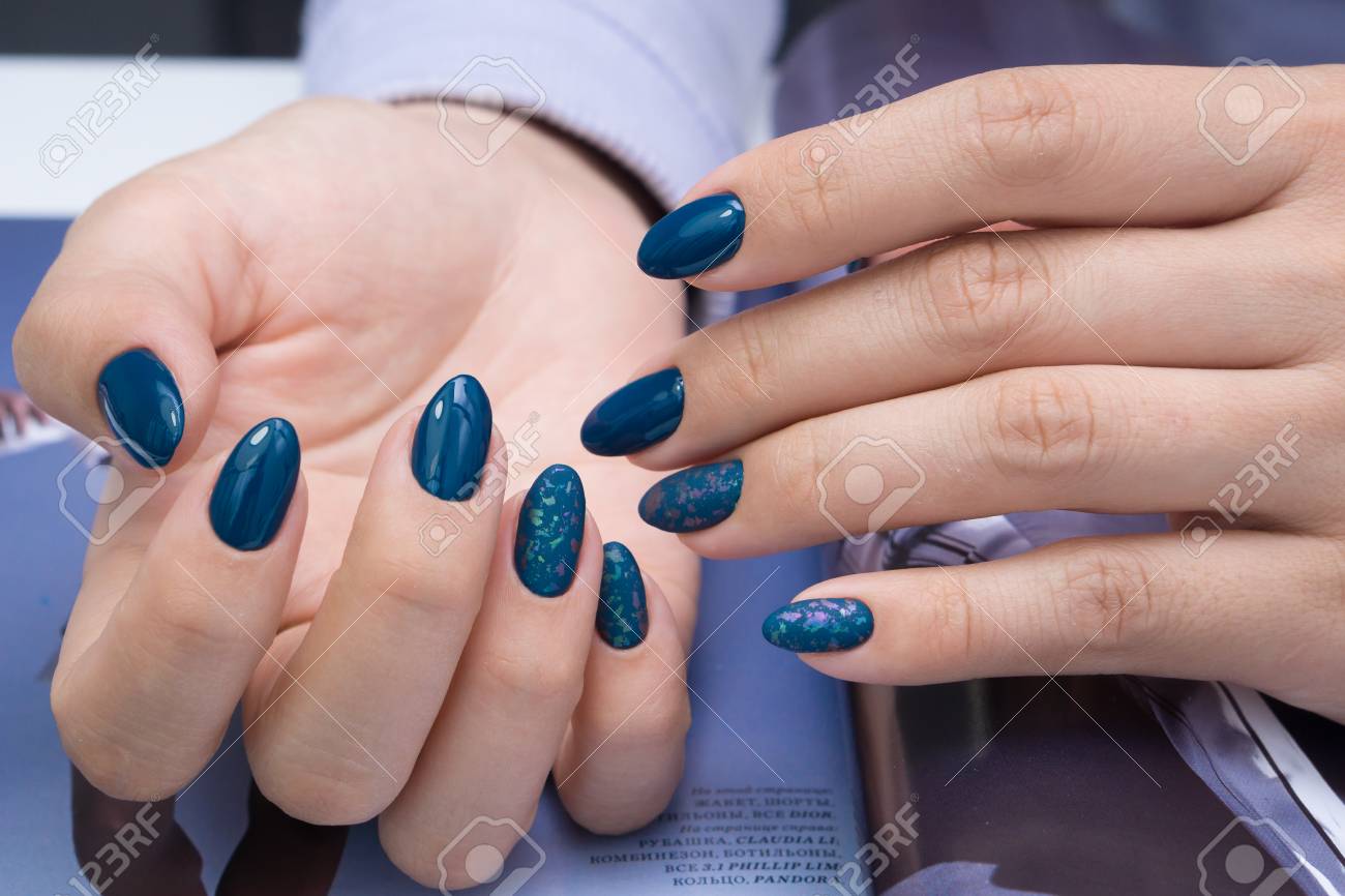 Beautiful natural nails and attractive manicure on women hands. - 92883939 Beautiful natural nails and attractive manicure on women hands. - 92883939