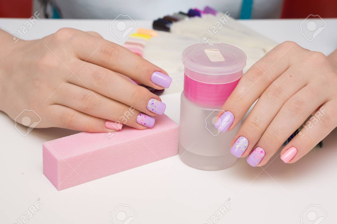 Beautiful natural nails and attractive manicure on women hands. - 92883944 Beautiful natural nails and attractive manicure on women hands. - 92883944